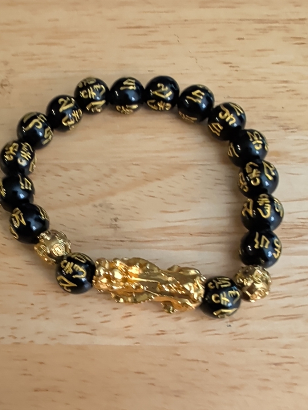 Black and Gold Beaded Bracelet with Gold Pixiu Accent